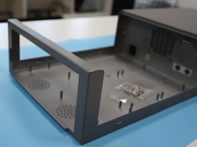 Sheet metal enclosure with critical assembly interfaces