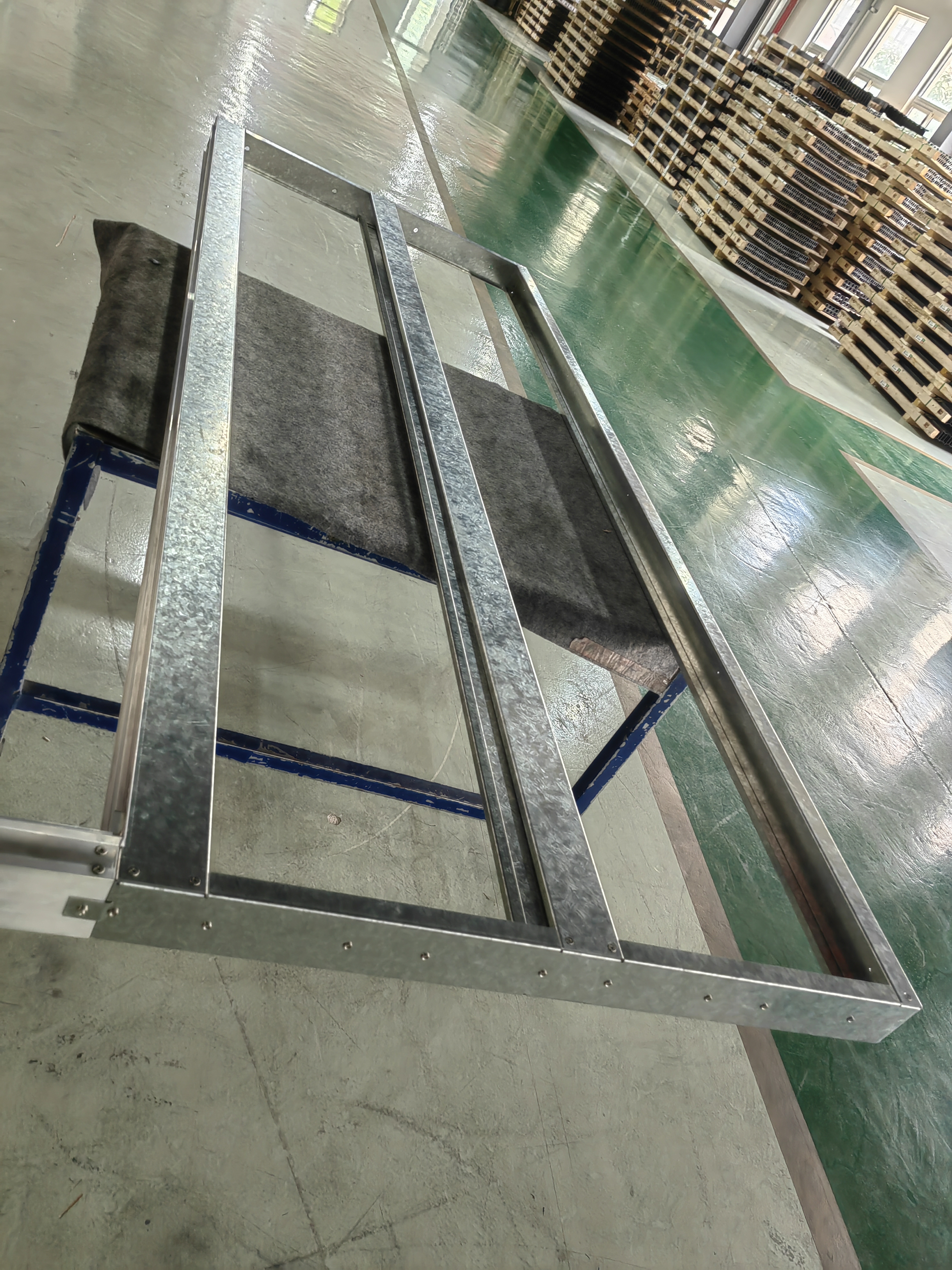 Sheet metal frame with inspected holes