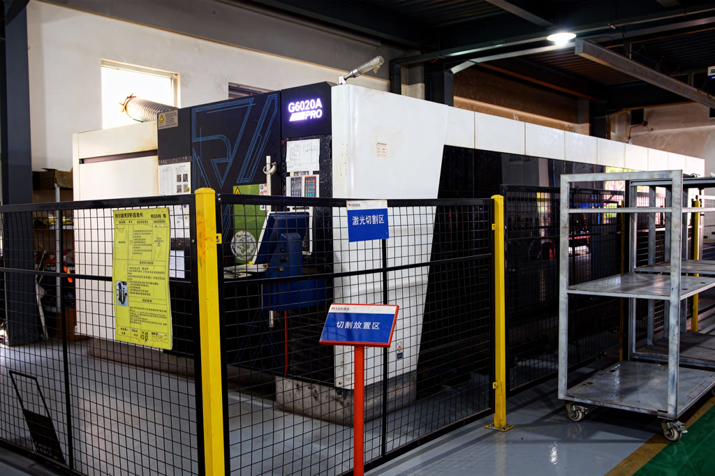 Laser cutting work area at STARWAY Nantong with posted work instructions and floor zone marking
