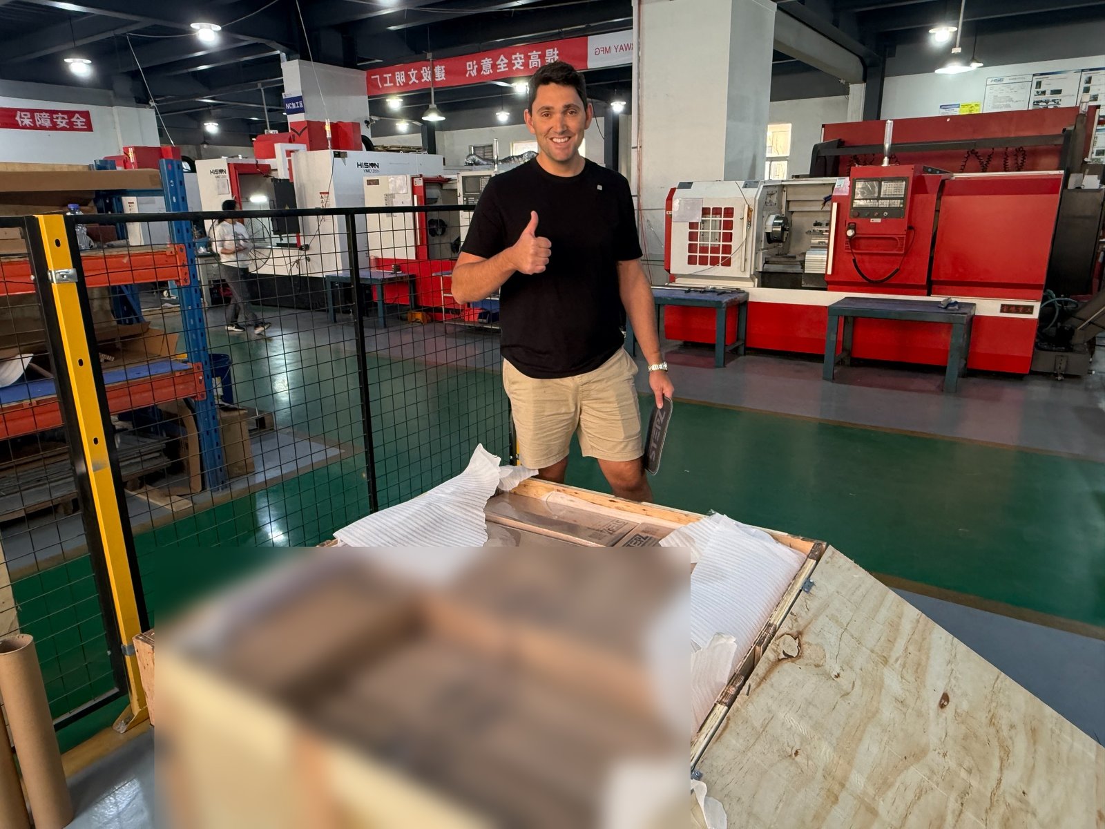 Australian customer reviewing packed marine equipment products in an export crate at STARWAY Nantong