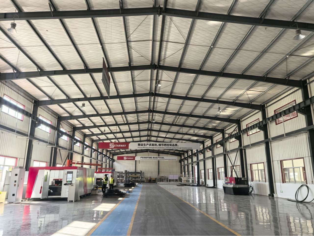 Wide view of the STARWAY Jingdezhen production hall with laser cutting machines