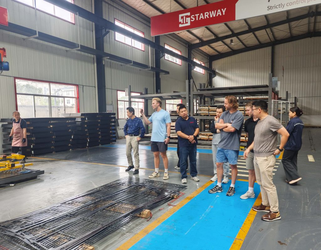 U.S. customer visitors touring the STARWAY production floor with the factory team